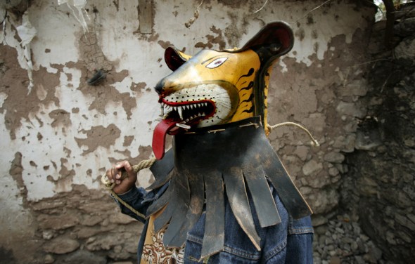 Tigre Fighter With Whip & Jaguar Mask. Copyright 2008 by the Associate Press/Eduardo Verdugo.  Used without permission.